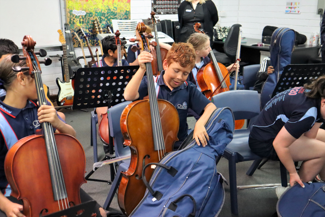 Students Investigate their new cellos